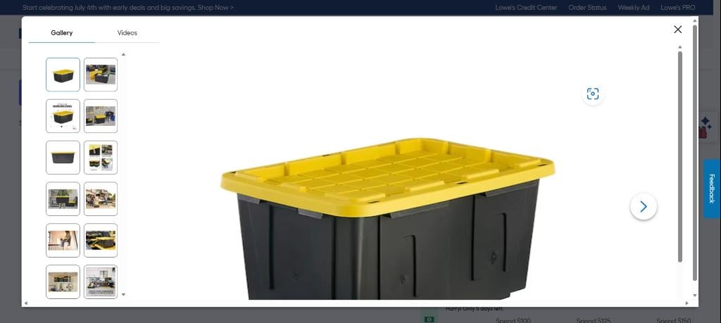 Black plastic moving bin with yellow lid